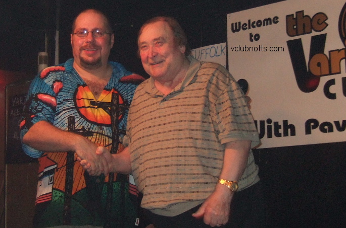 Bernard Manning shaking hands with compere Pav at the Variety club Notts